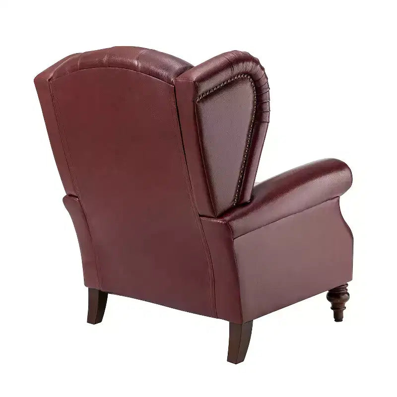 Poltrona a pozzetto Amanda 33, ampia, in vera pelle con gambe coniche in legno massiccio e bordo con borchie | ART OF LIVING DESIGNS
