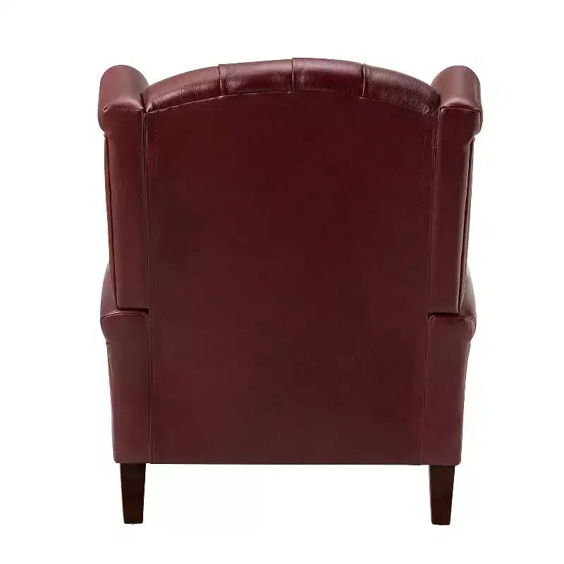 Poltrona a pozzetto Amanda 33, ampia, in vera pelle con gambe coniche in legno massiccio e bordo con borchie | ART OF LIVING DESIGNS