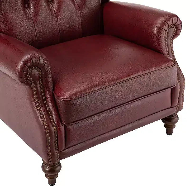 Poltrona a pozzetto Amanda 33, ampia, in vera pelle con gambe coniche in legno massiccio e bordo con borchie | ART OF LIVING DESIGNS