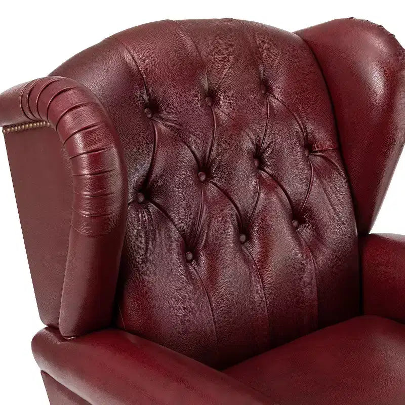Poltrona a pozzetto Amanda 33, ampia, in vera pelle con gambe coniche in legno massiccio e bordo con borchie | ART OF LIVING DESIGNS