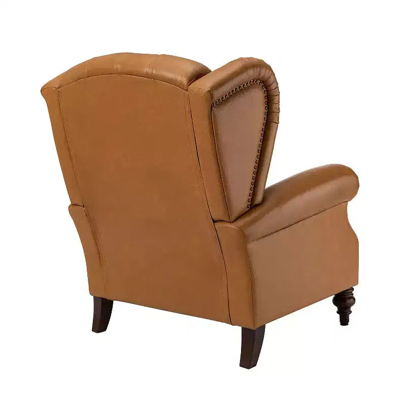 Poltrona a pozzetto Amanda 33, ampia, in vera pelle con gambe coniche in legno massiccio e bordo con borchie | ART OF LIVING DESIGNS