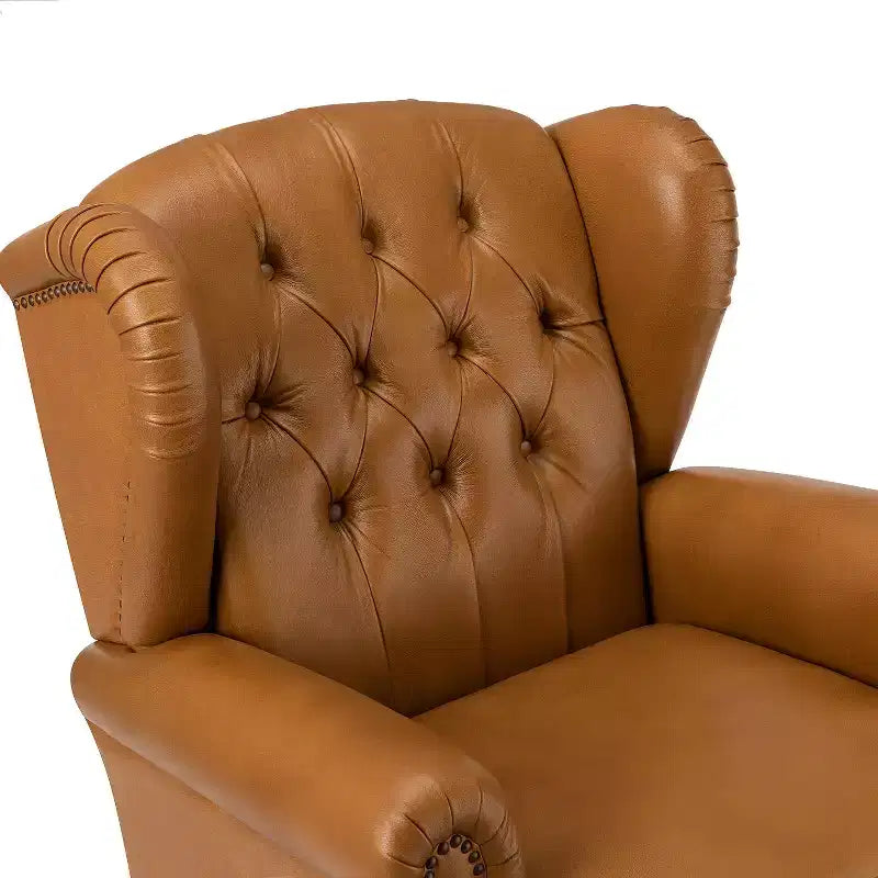 Poltrona a pozzetto Amanda 33, ampia, in vera pelle con gambe coniche in legno massiccio e bordo con borchie | ART OF LIVING DESIGNS
