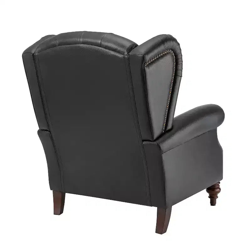 Poltrona a pozzetto Amanda 33, ampia, in vera pelle con gambe coniche in legno massiccio e bordo con borchie | ART OF LIVING DESIGNS