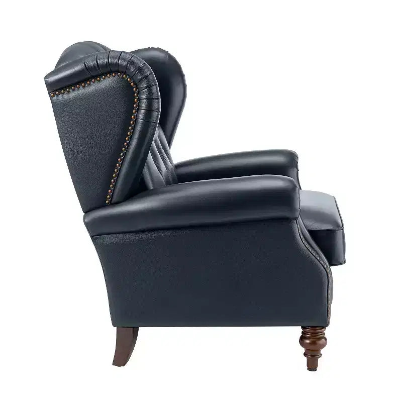 Poltrona a pozzetto Amanda 33, ampia, in vera pelle con gambe coniche in legno massiccio e bordo con borchie | ART OF LIVING DESIGNS