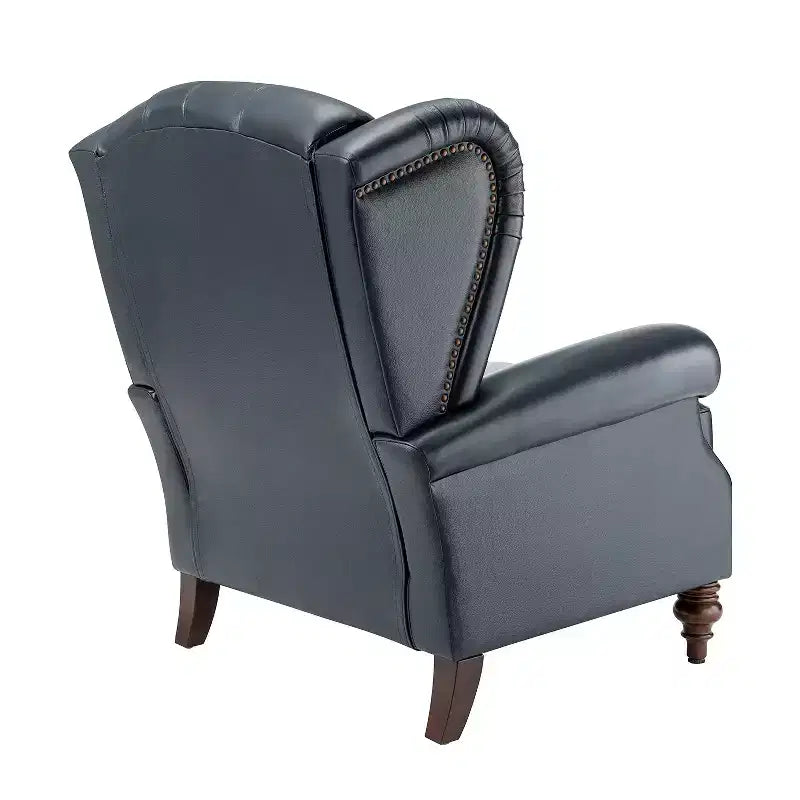 Poltrona a pozzetto Amanda 33, ampia, in vera pelle con gambe coniche in legno massiccio e bordo con borchie | ART OF LIVING DESIGNS
