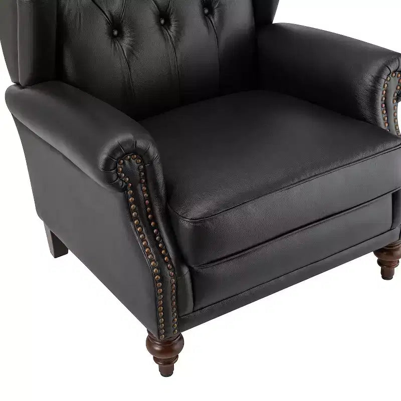 Poltrona a pozzetto Amanda 33, ampia, in vera pelle con gambe coniche in legno massiccio e bordo con borchie | ART OF LIVING DESIGNS