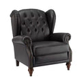 Poltrona a pozzetto Amanda 33, ampia, in vera pelle con gambe coniche in legno massiccio e bordo con borchie | ART OF LIVING DESIGNS